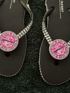 Black Flip Flops with Rhinestone Straps and Pink Gymnastics Medallions